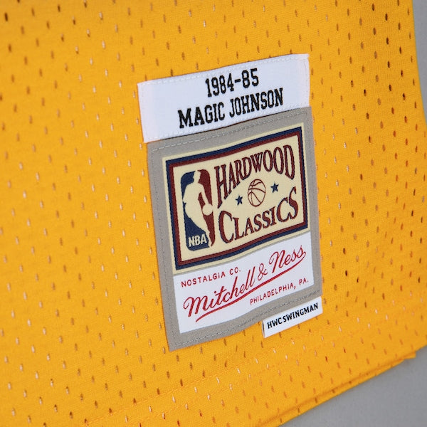 Magic Johnson Los Angeles Lakers 1984/85 Hardwood Classics Fadeaway Swingman Player Jersey - Gold/Purple